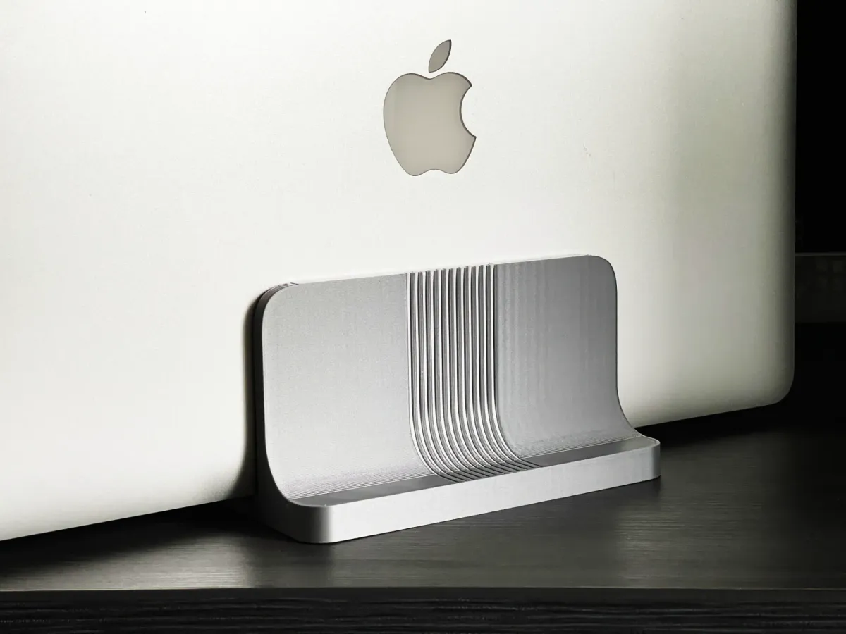Soporte vertical para notebook con apoyos blandos