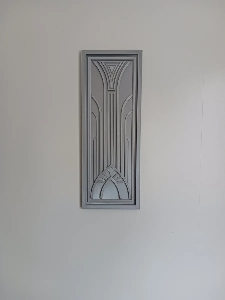 Panel de pared con relieve geométrico escalonado