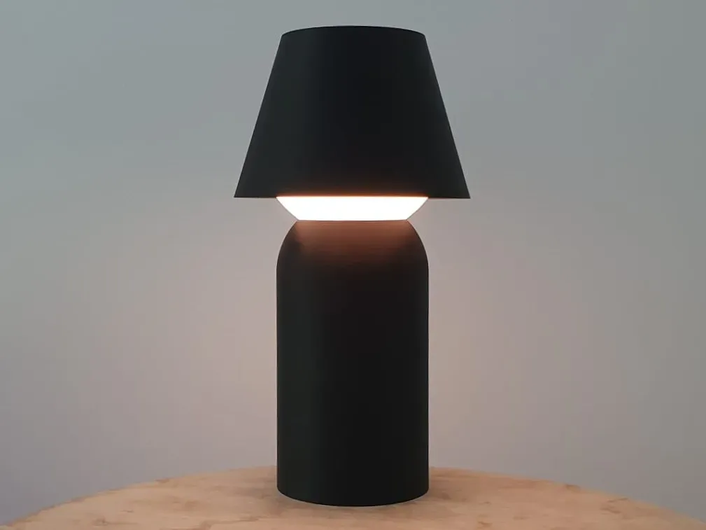 Lámpara de mesa con efecto eclipse