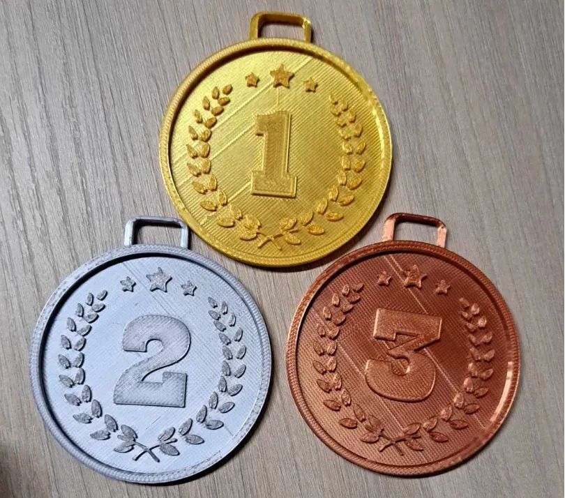 Medallas de primer, segundo y tercer puesto