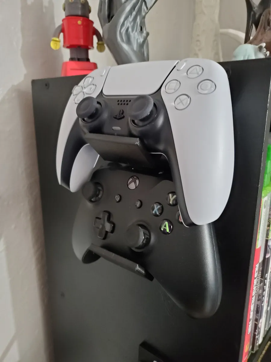 Soporte vertical de pared para dos joysticks
