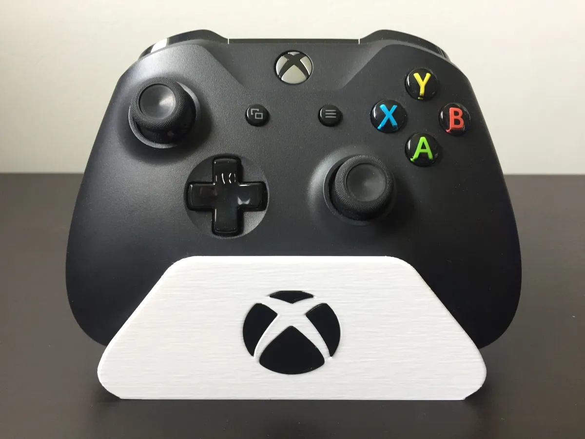 Atril vertical para joystick con frente calado