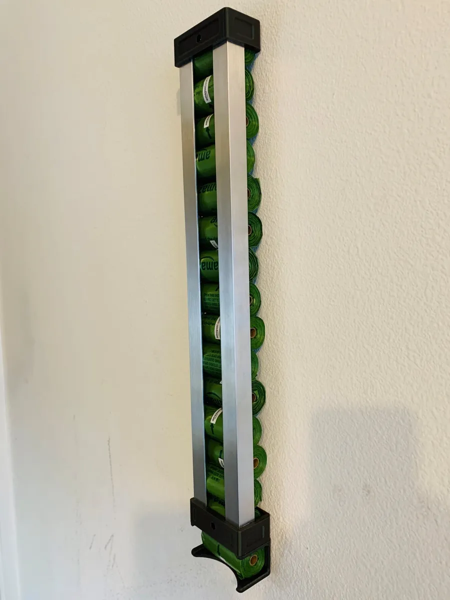 Dispensador de bolsitas para colgar en la pared