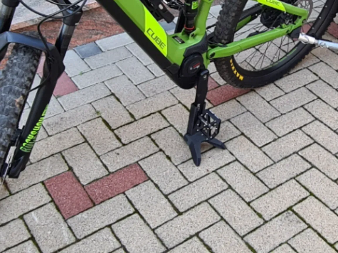 Pie de apoyo plegable para bicicleta