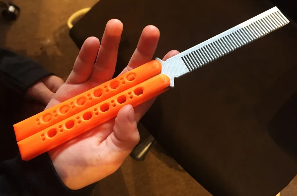 Peine plegable tipo cuchillo mariposa