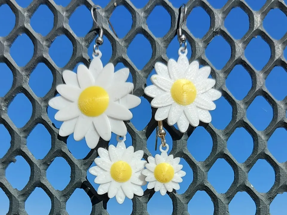 Juego de aros, pulsera y collar de margaritas