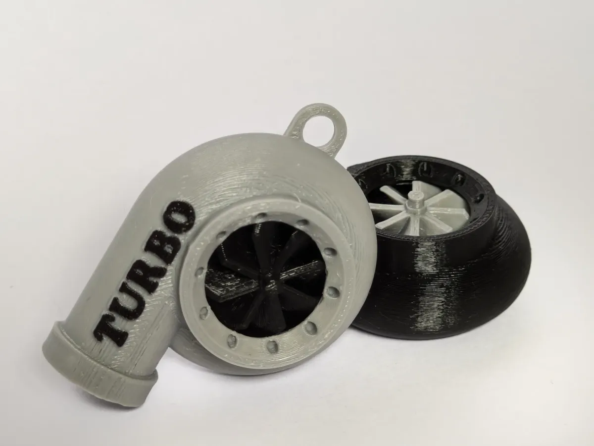 Llavero con turbina giratoria y silbato