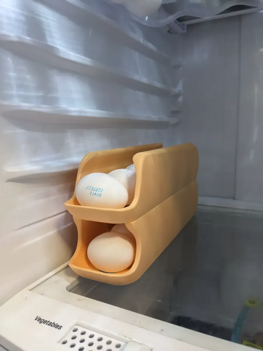 Dispensador de huevos con rotación automática
