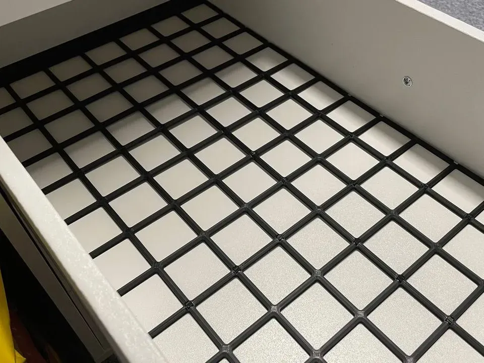 Base modular de perfil bajo para cajón