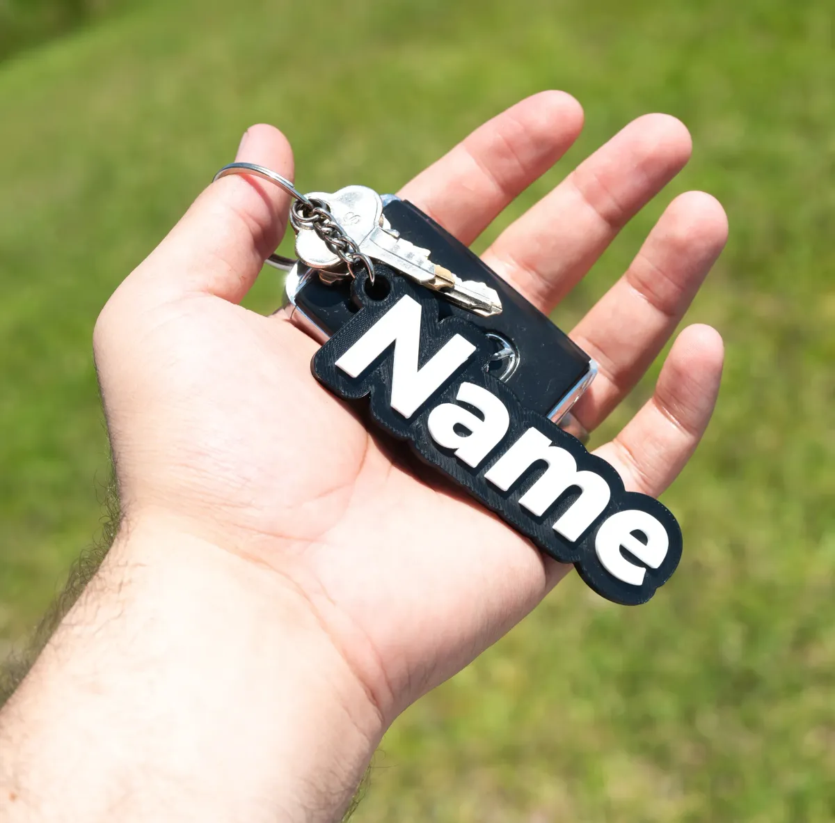 Llavero con nombre personalizado en letra enlazada
