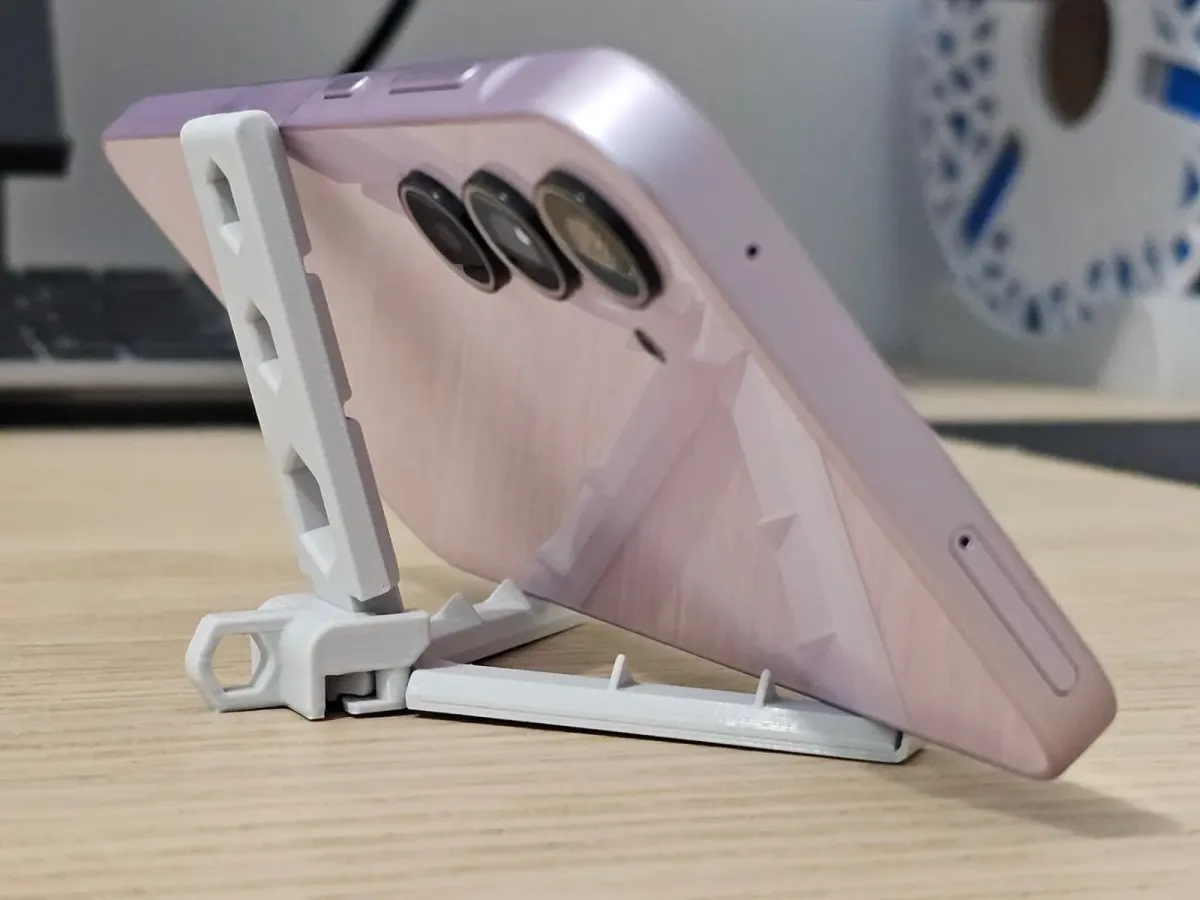 Soporte de celular plegable con brazos automáticos