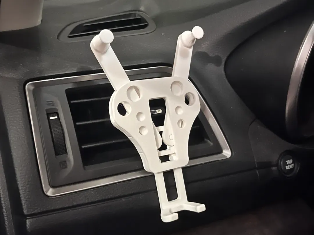 Soporte de celular para rejilla del aire