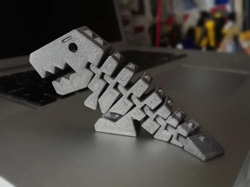 Tiranosaurio articulado con eslabones reforzados