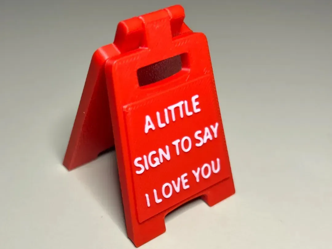 Cartelito con mensaje de amor en relieve