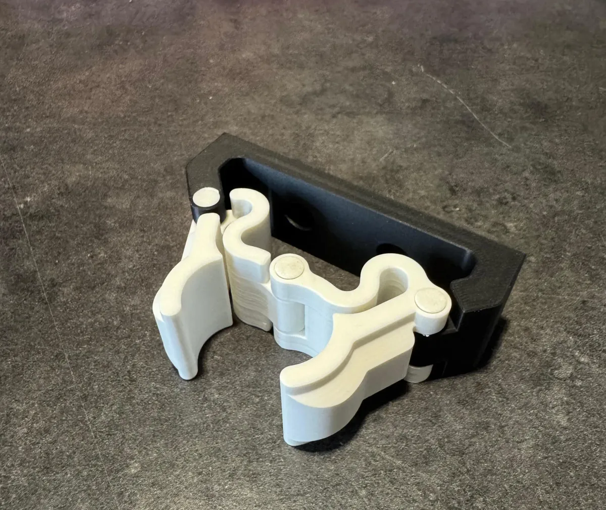 Gancho de pared para escoba y secador