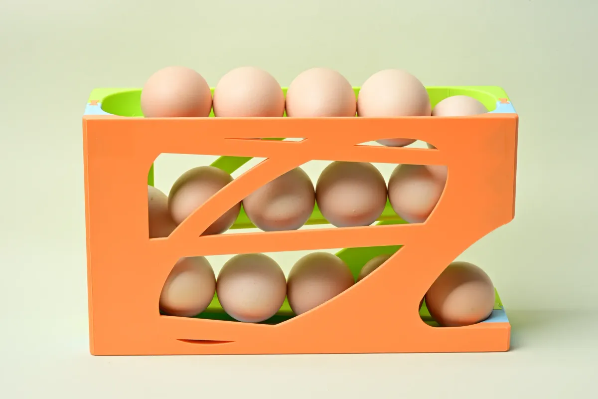 Caja organizadora de huevos con salida rodante