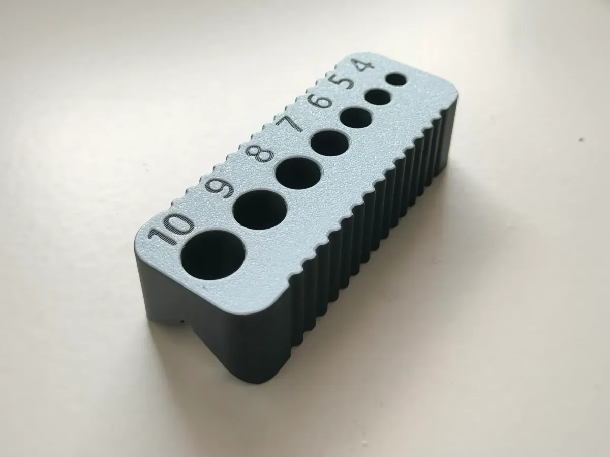 Guía de taladro con bujes métricos