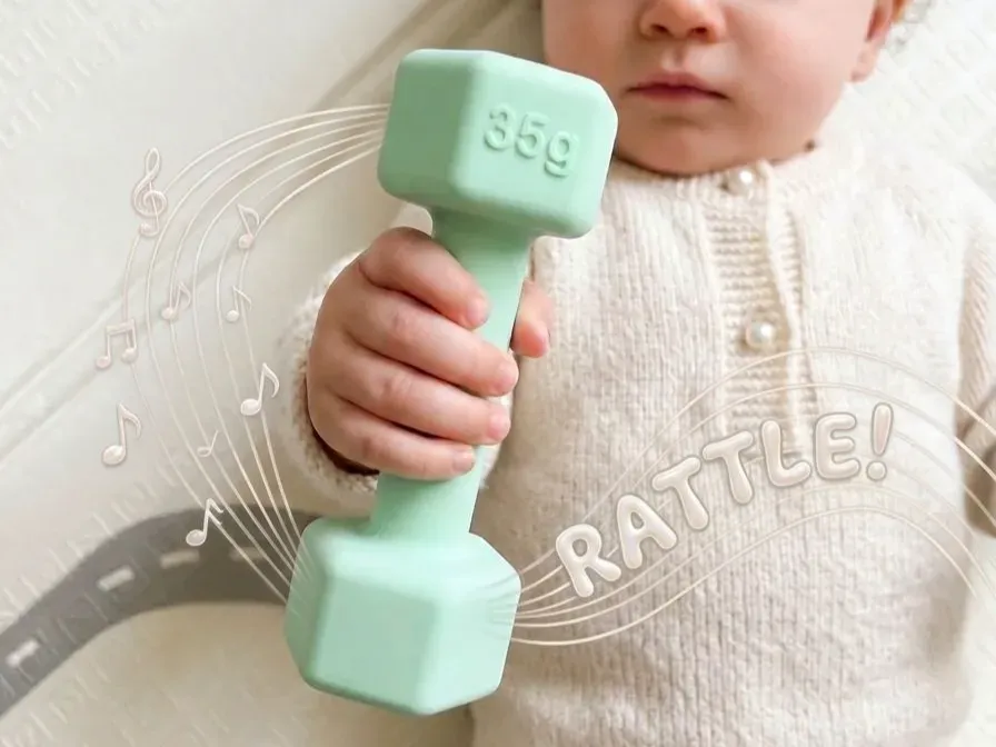 Sonajero con forma de pesita para bebé