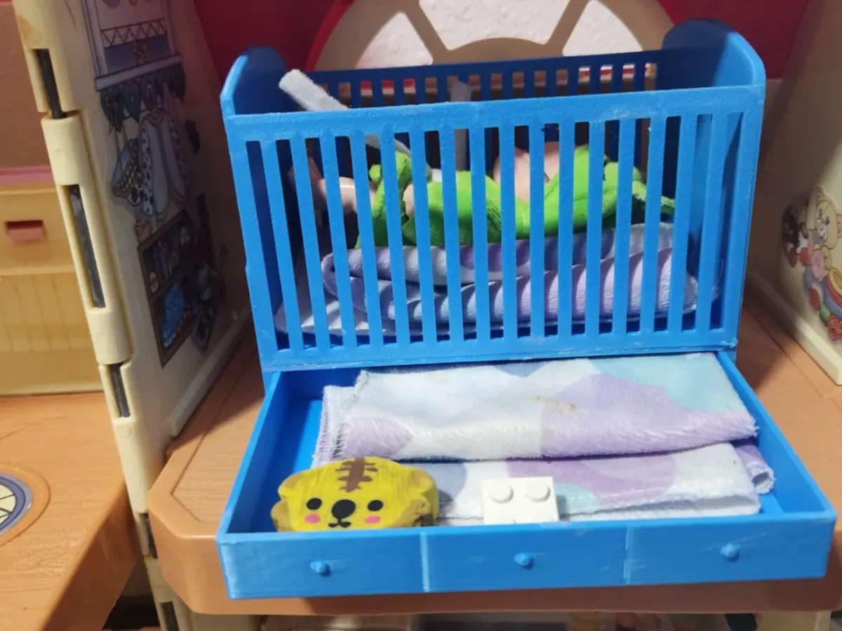 Cuna para casa de muñecas con barrotes