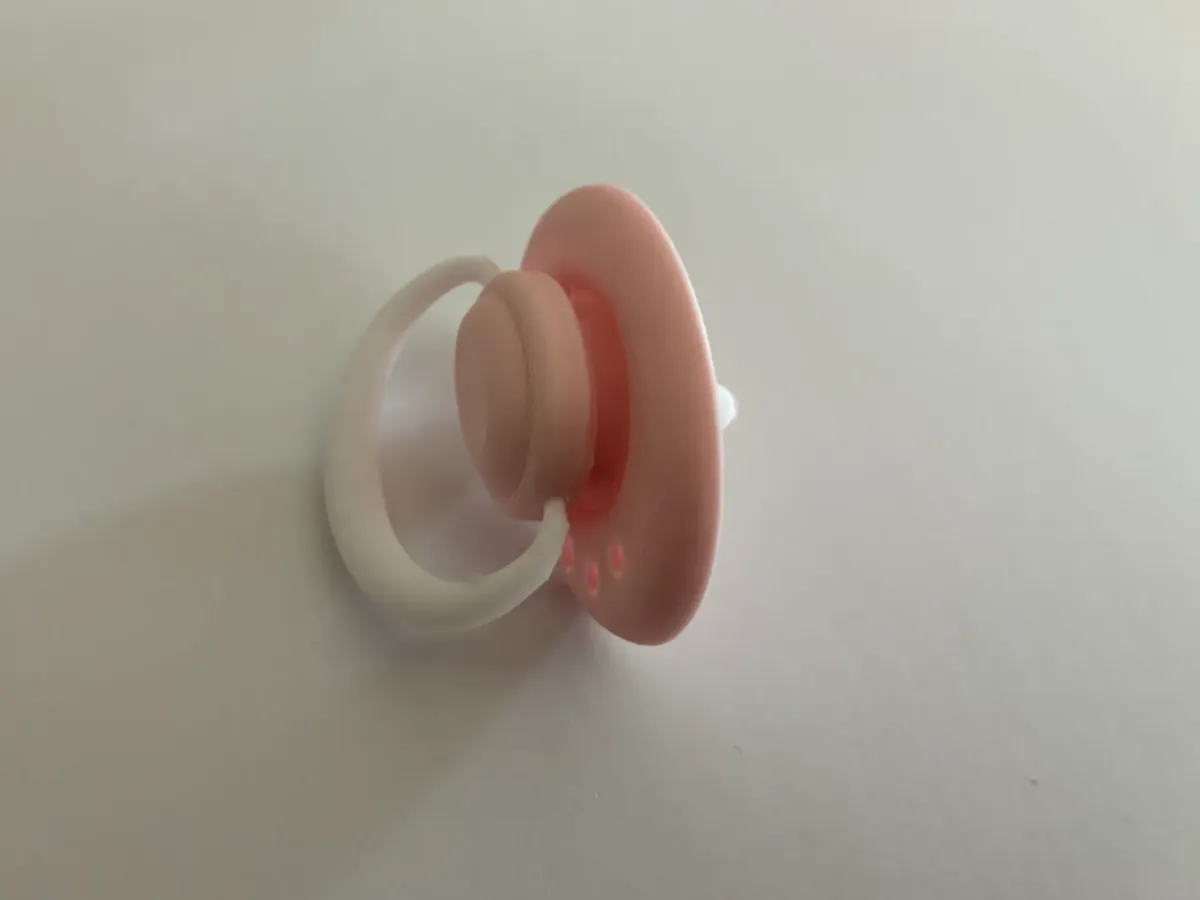 Chupete de juguete para muñecos