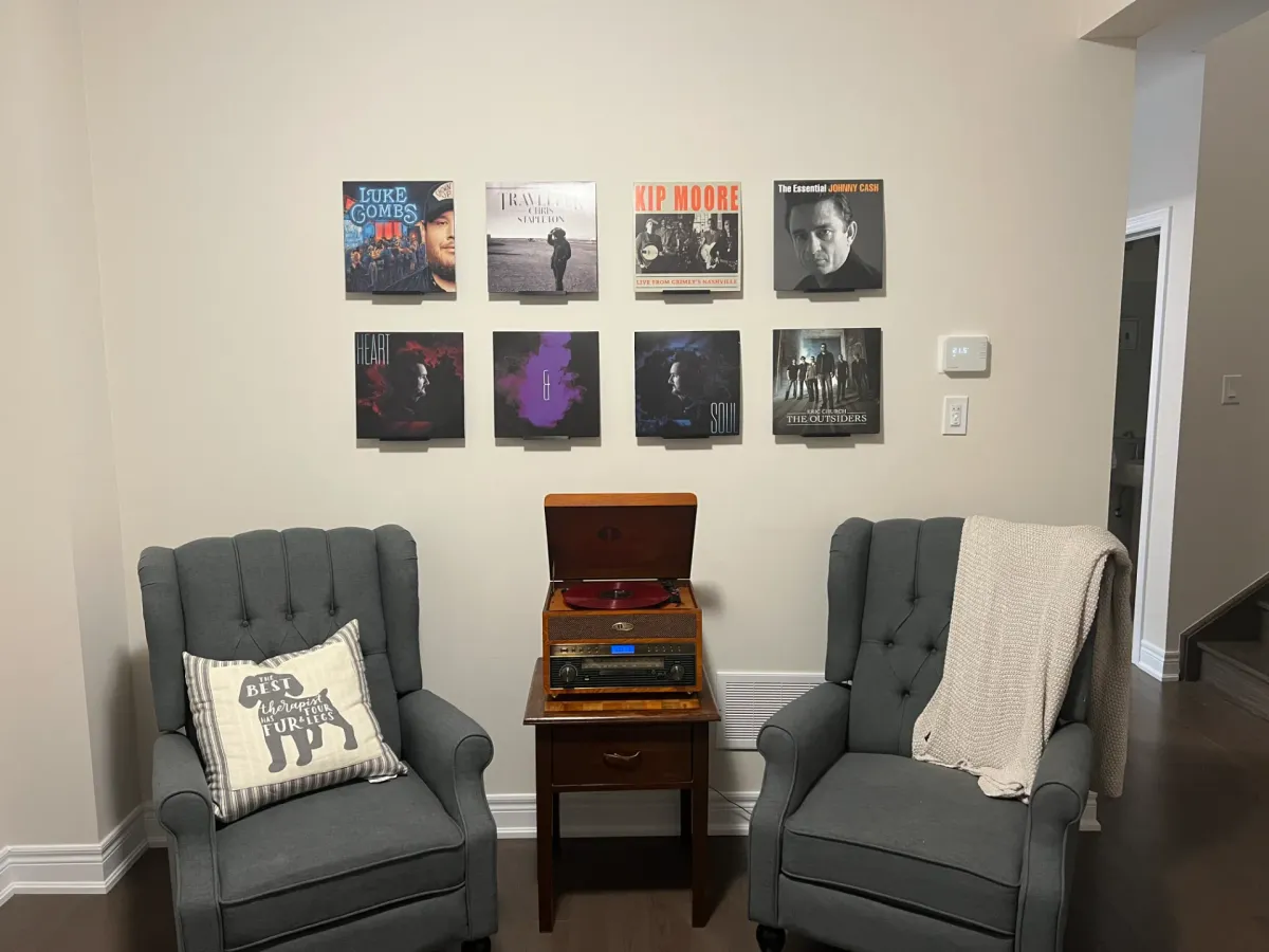 Soporte de pared para vinilo de frente