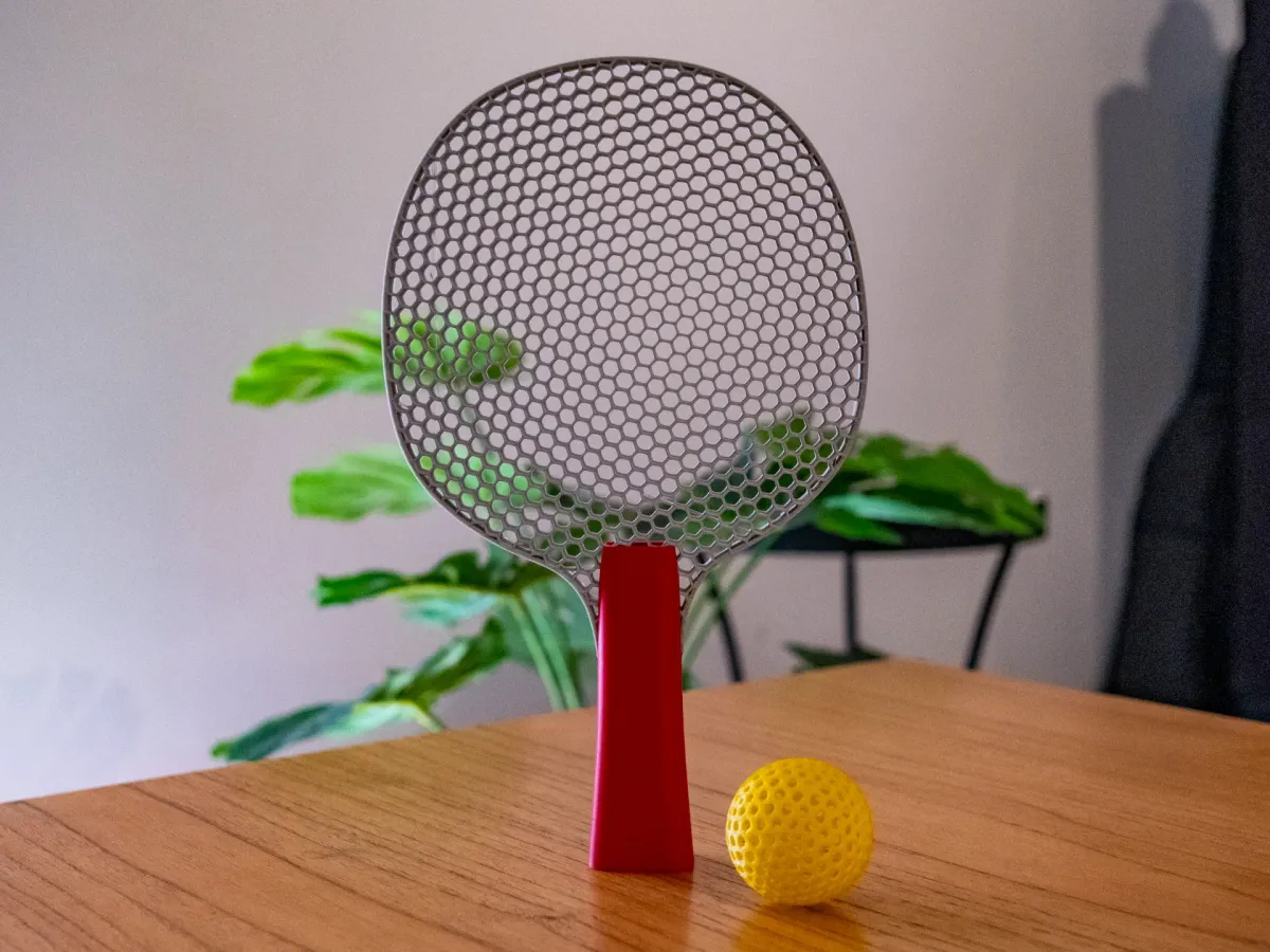 Paleta de tenis de mesa silenciosa y calada