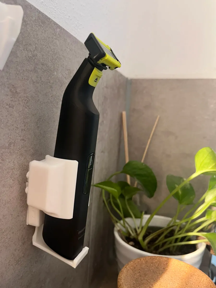 Soporte a presión para afeitadora eléctrica