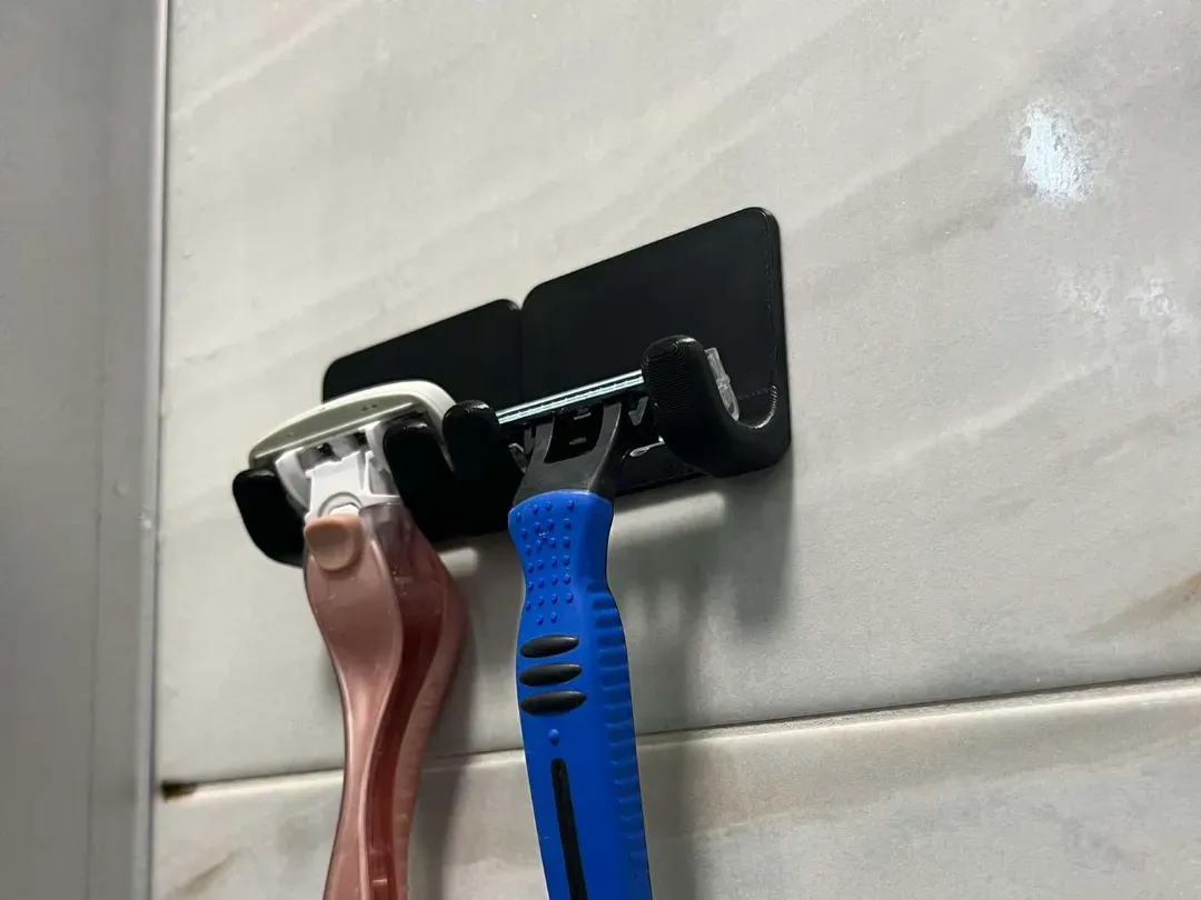 Colgador de maquinita de afeitar para estante