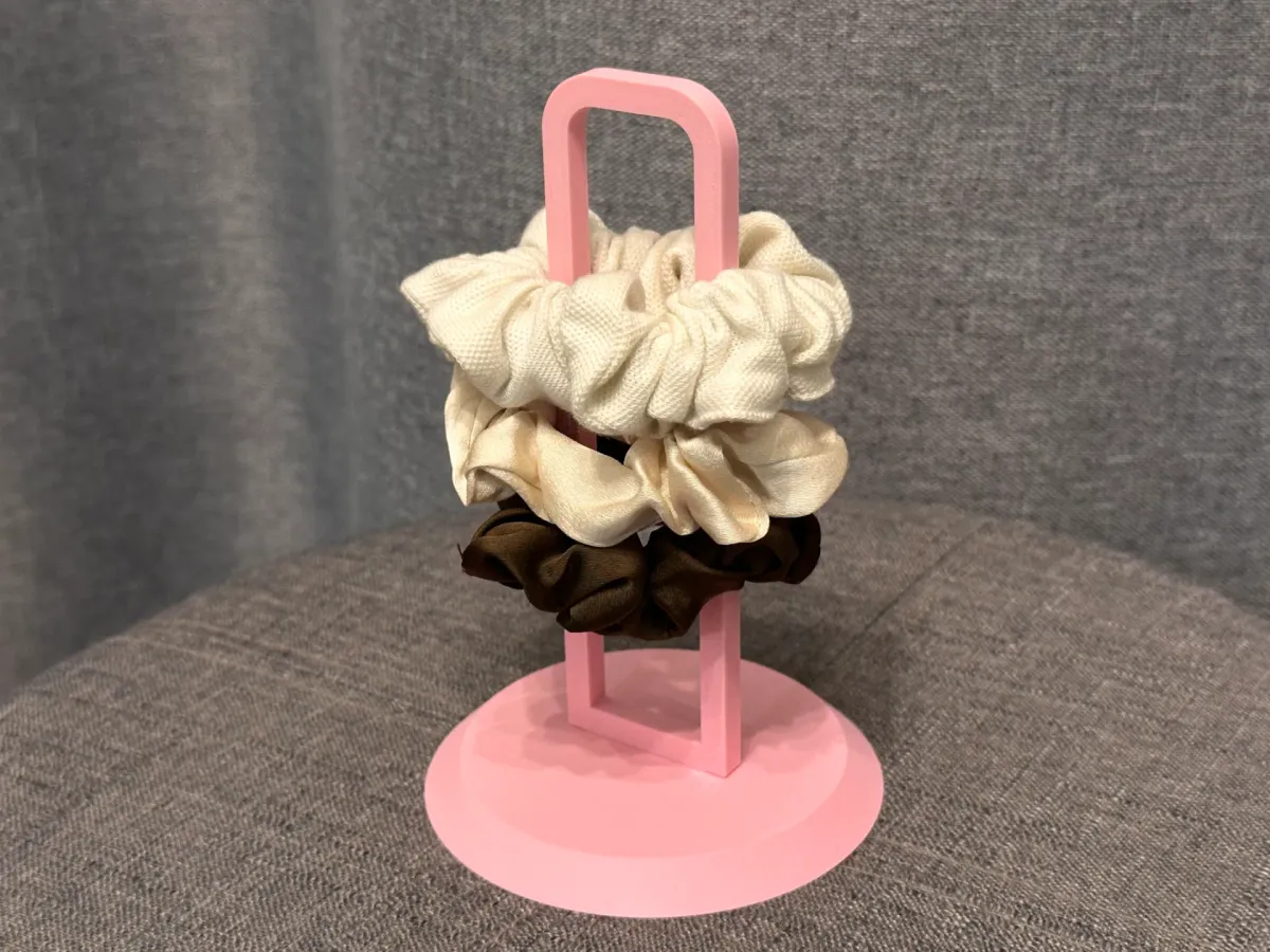 Columna organizadora de colitas para el pelo