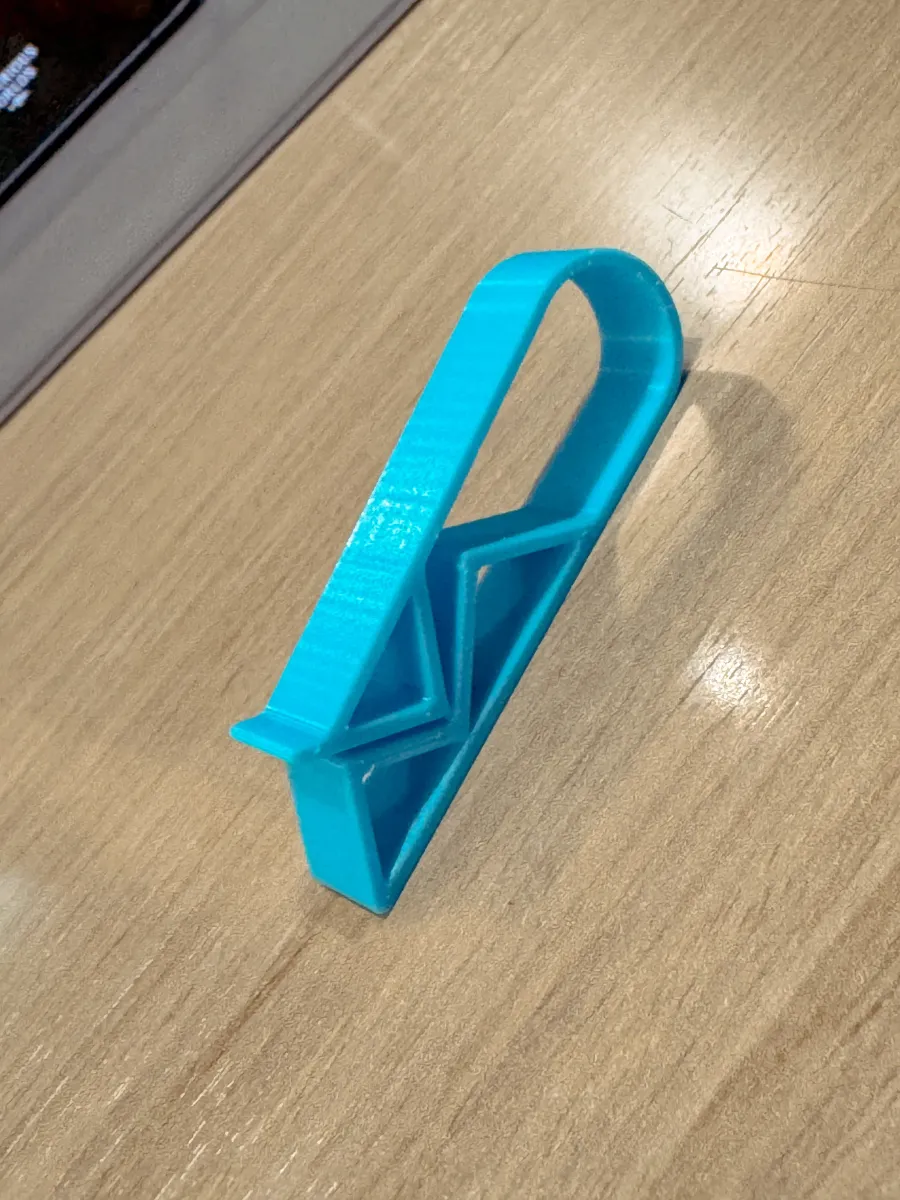 Pinza flexible para bolsa de residuos