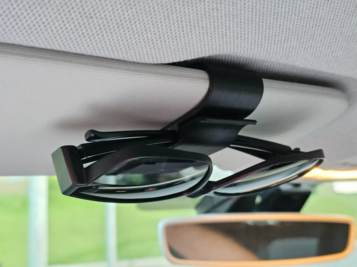Soporte magnético de anteojos para visera del auto