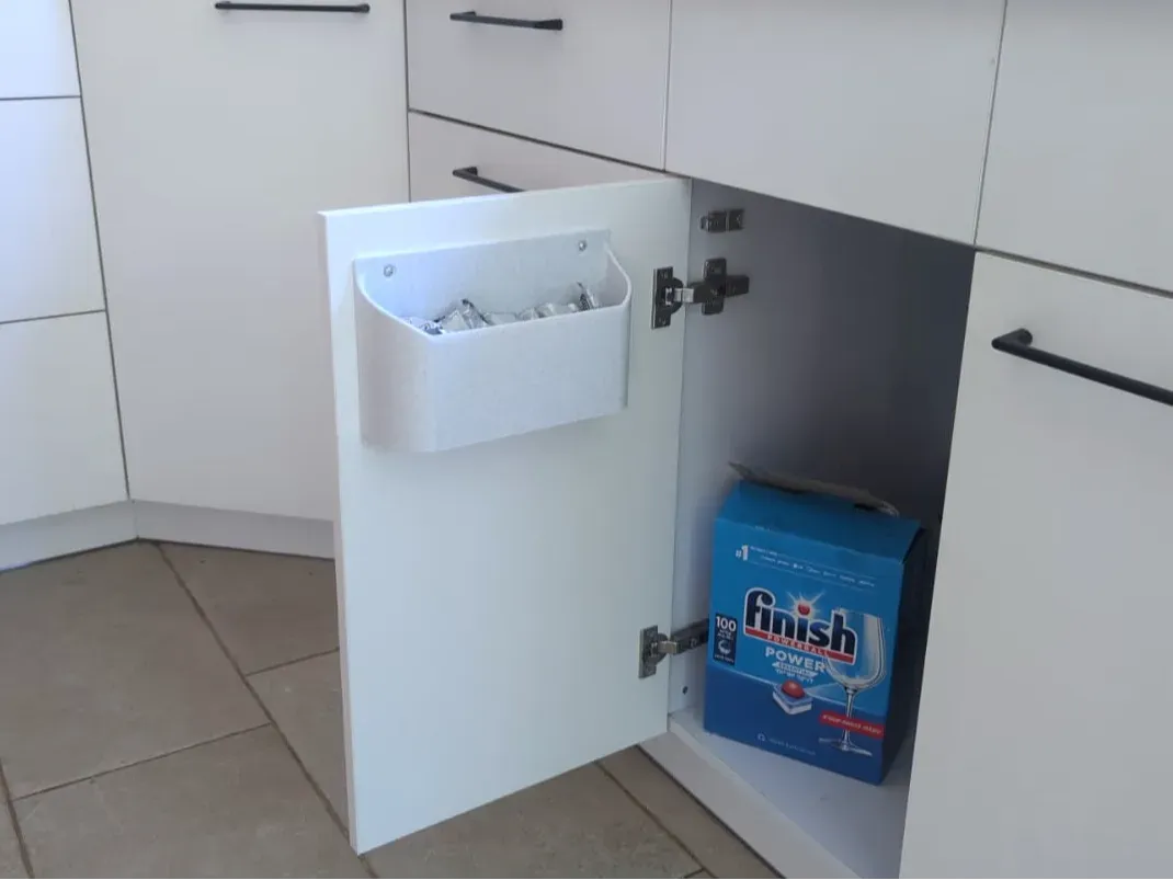 Dispensador de pastillas de lavavajillas para puerta