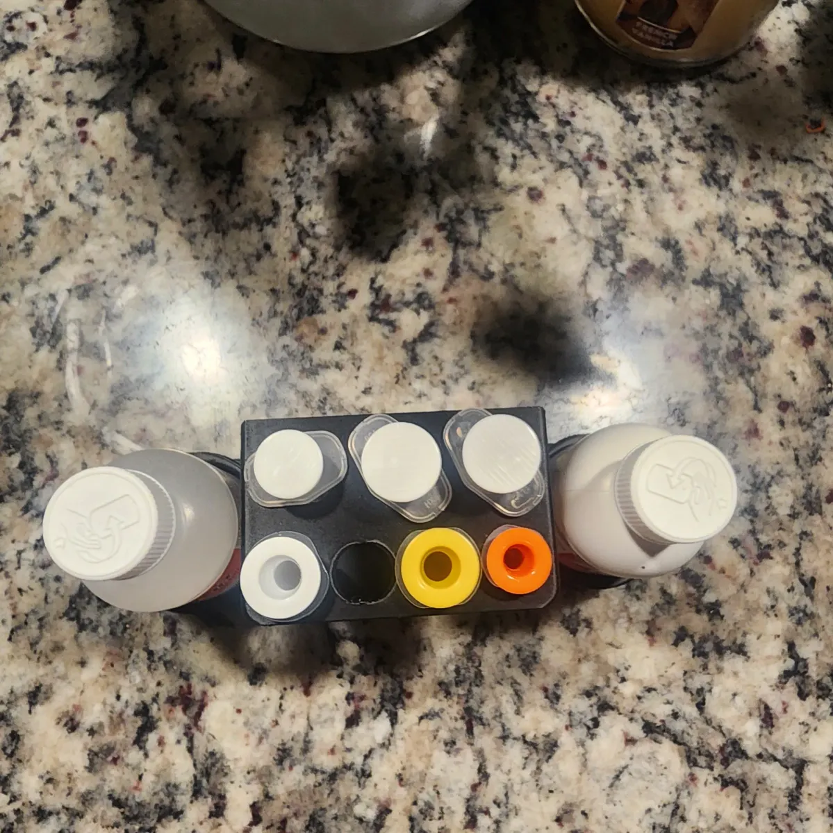 Soporte para jeringas y frascos de remedio