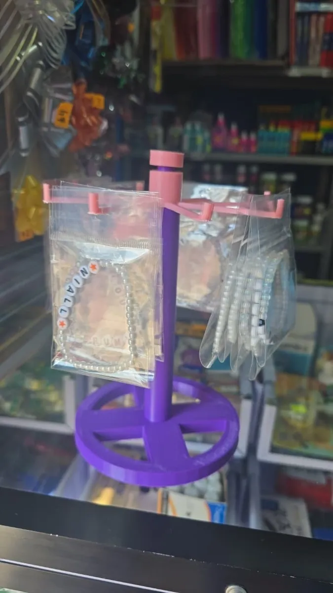 Exhibidor giratorio de llaveros, pulseras y aros