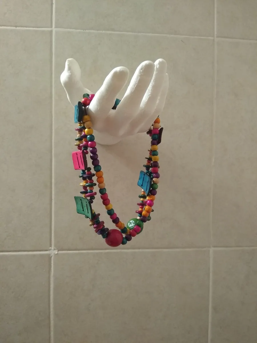 Percha de mano para exhibir en mostrador