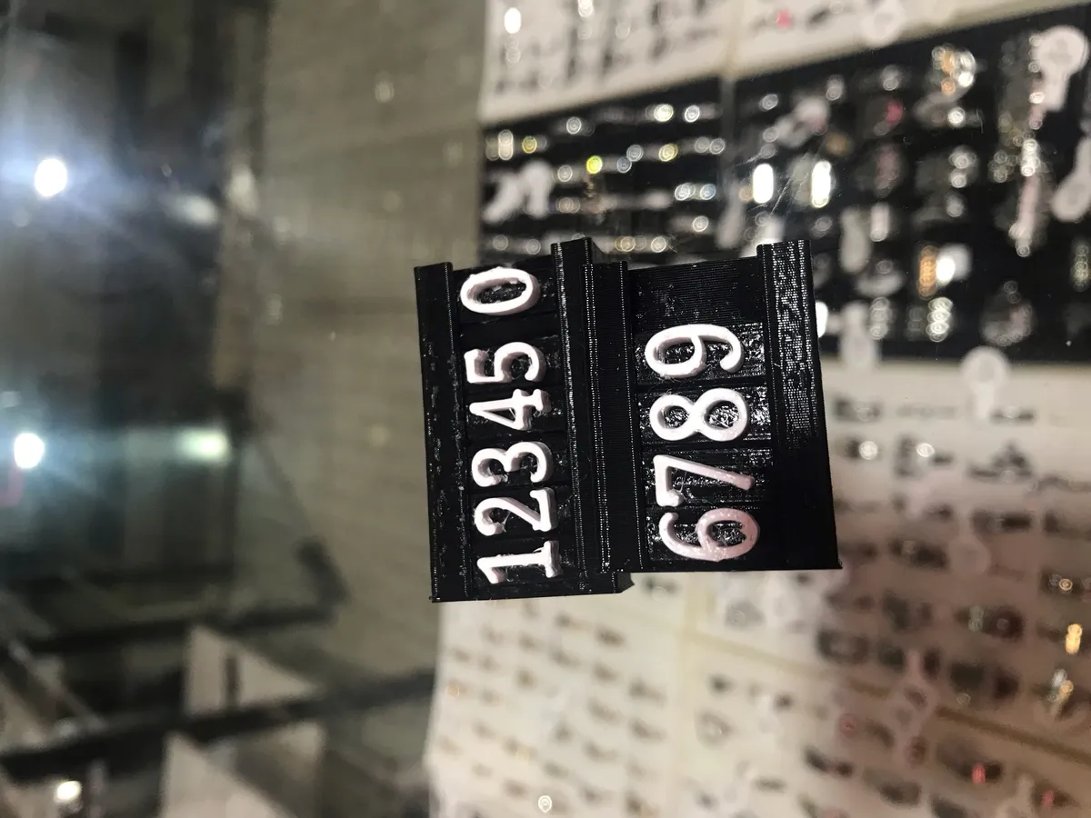 Exhibidor de precios para vidriera