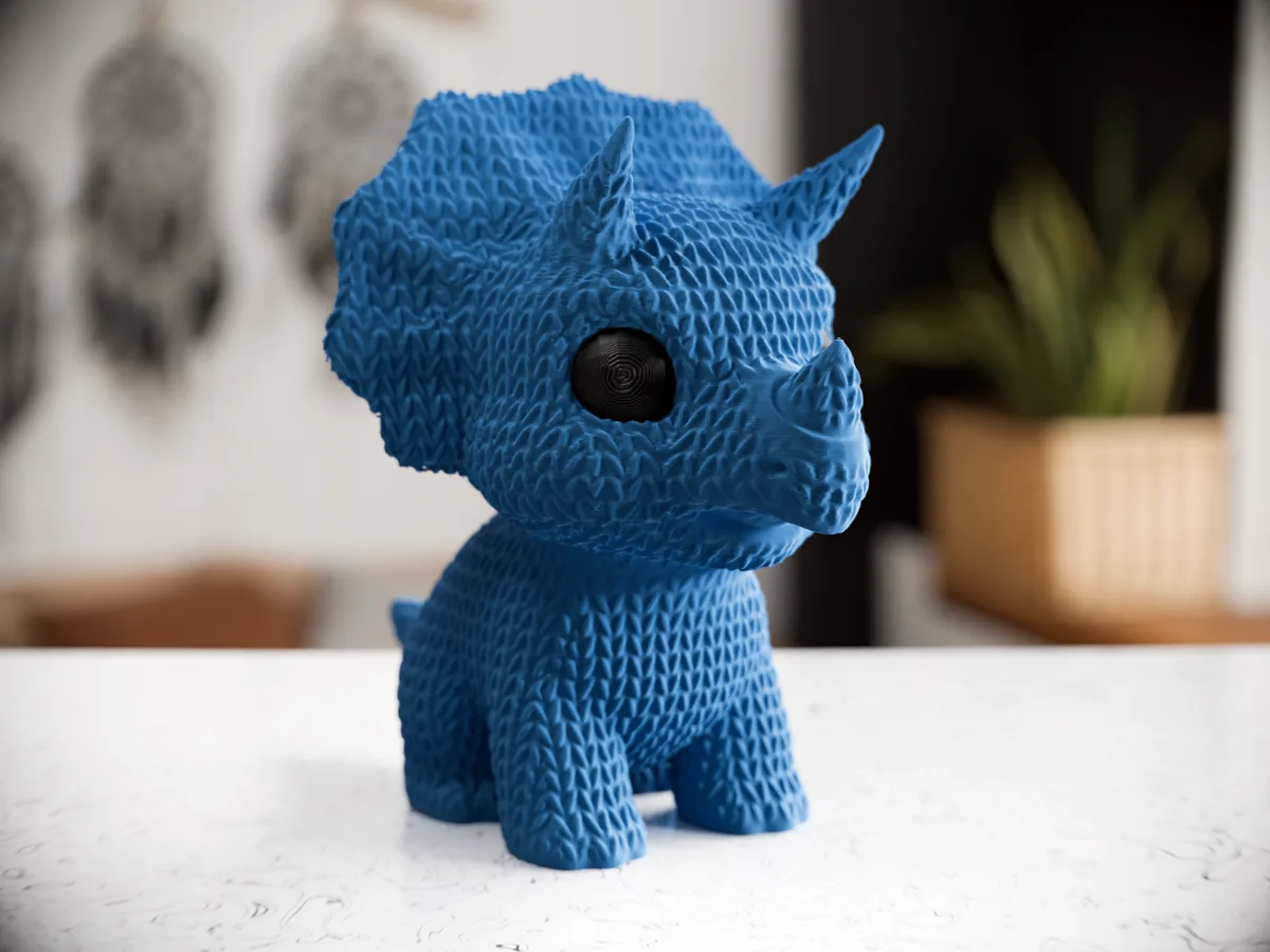 Triceratops con textura de tejido