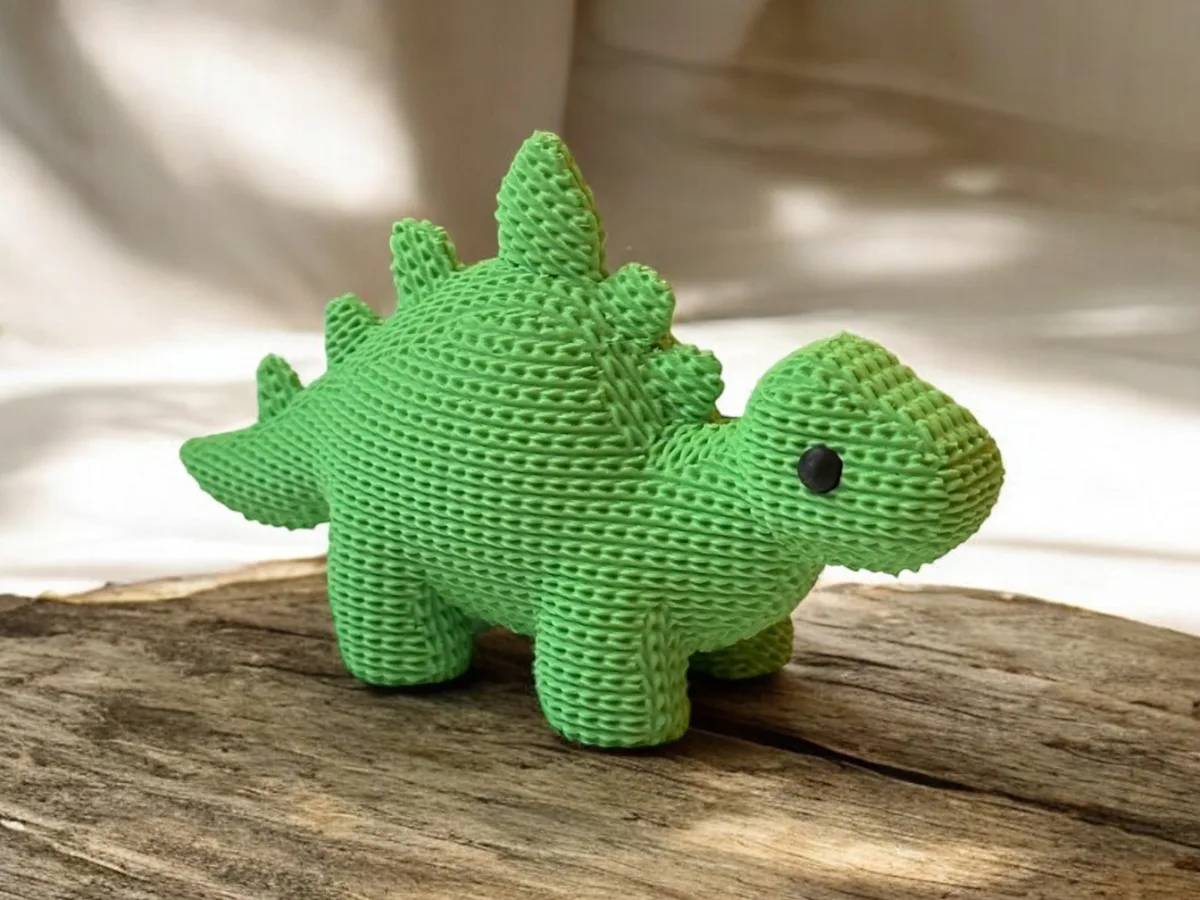 Estegosaurio con textura de tejido