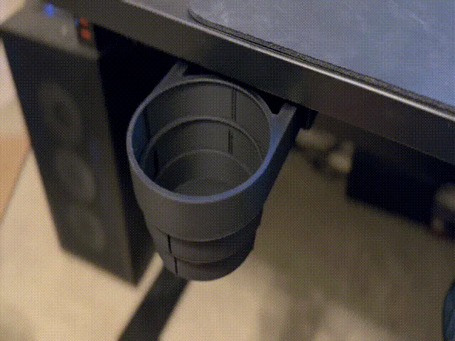 Portavaso retráctil para escritorio