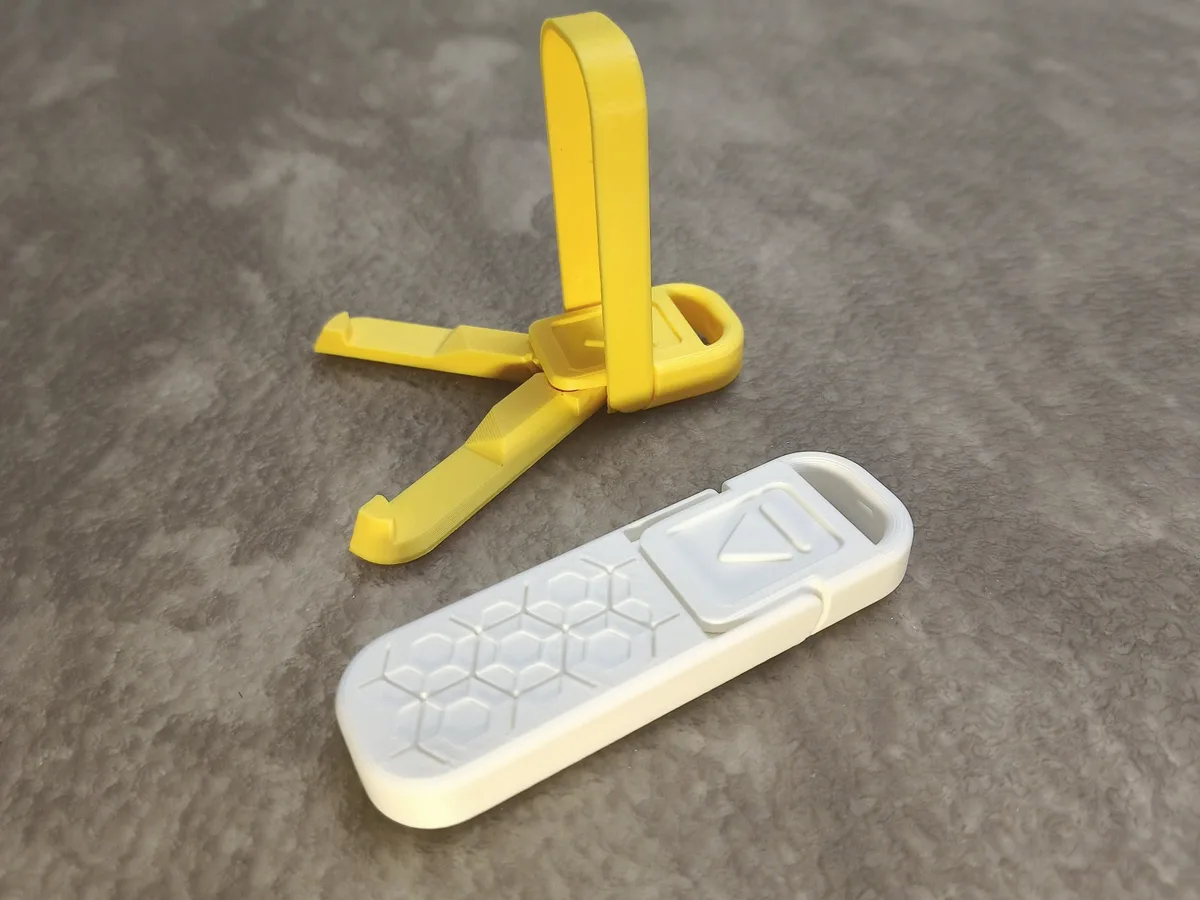 Soporte de celular plegable de trece gramos