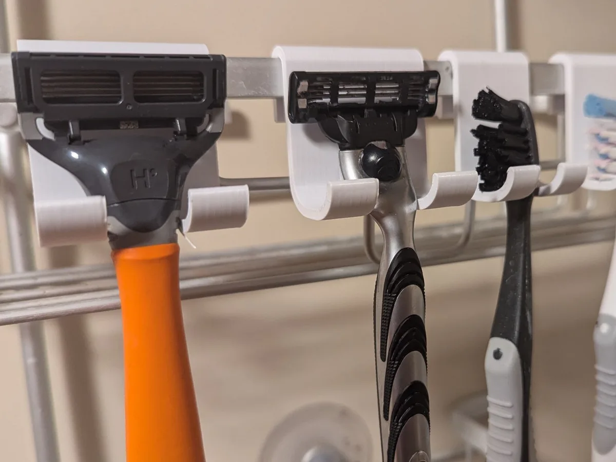 Portacepillos para la reja de la ducha