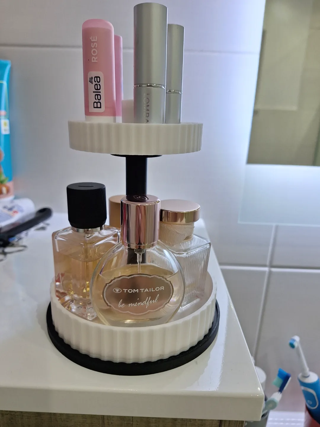 Exhibidor giratorio de perfumes