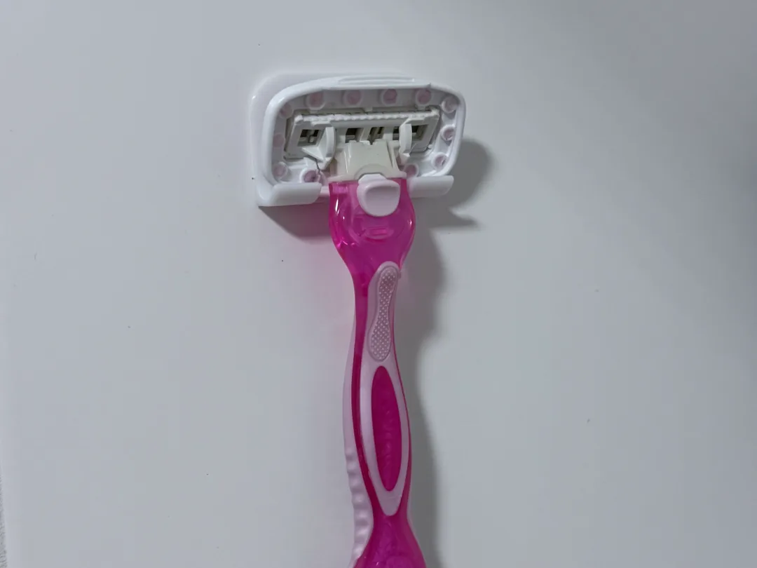 Soporte de pared para afeitadora