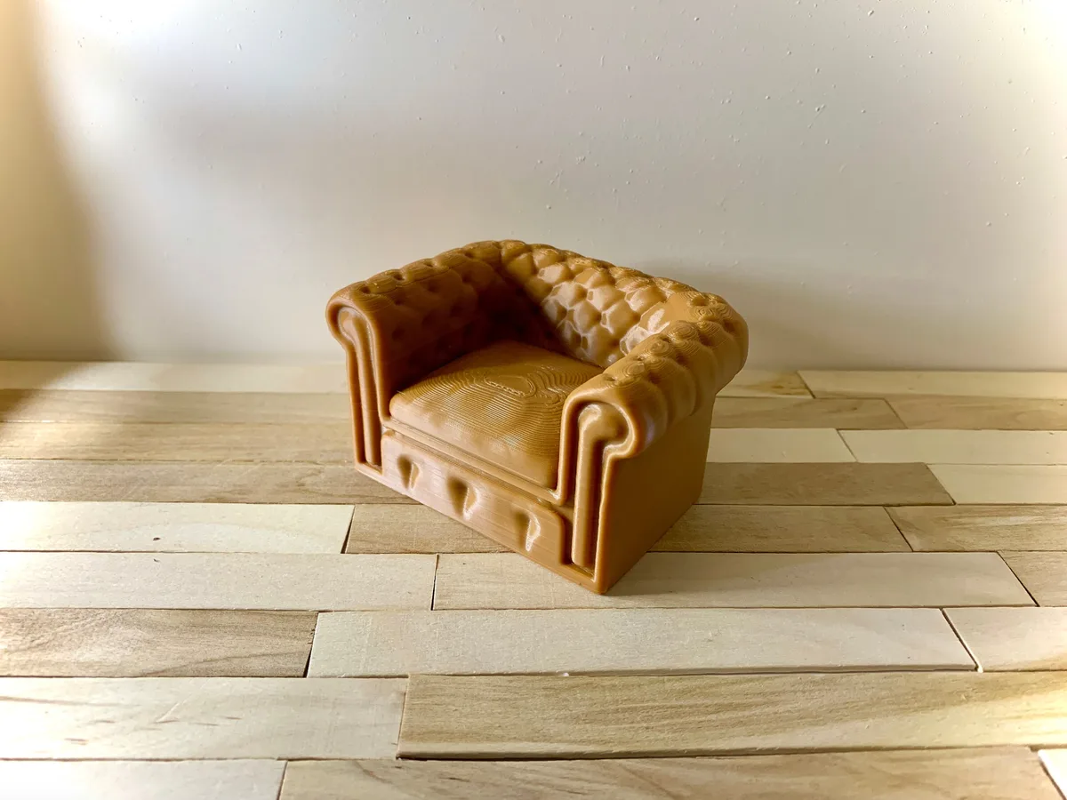 Sillón capitoné en miniatura