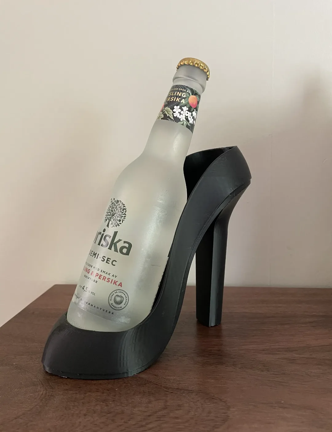 Sostén de botella con forma de zapato