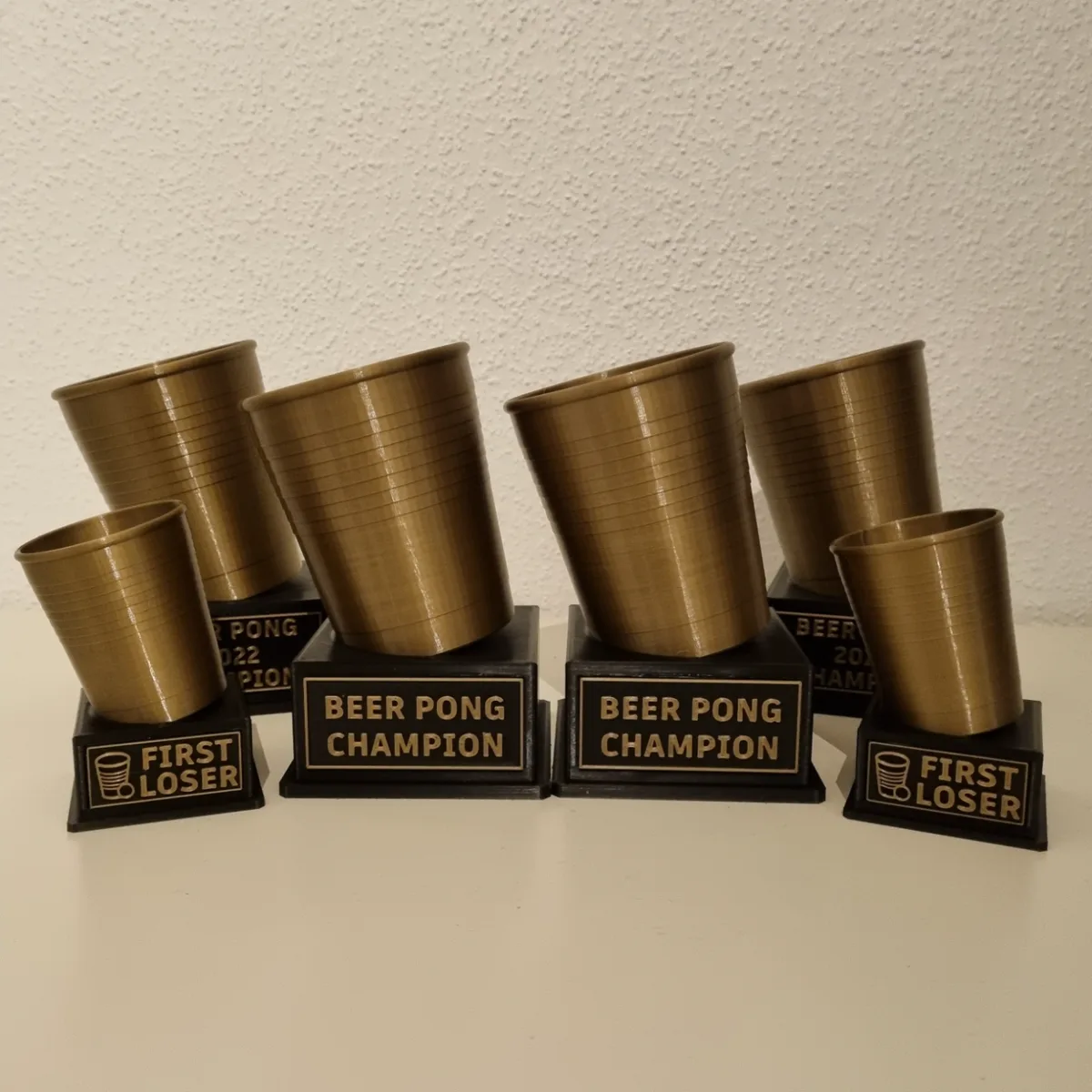 Trofeo de juego de vasos