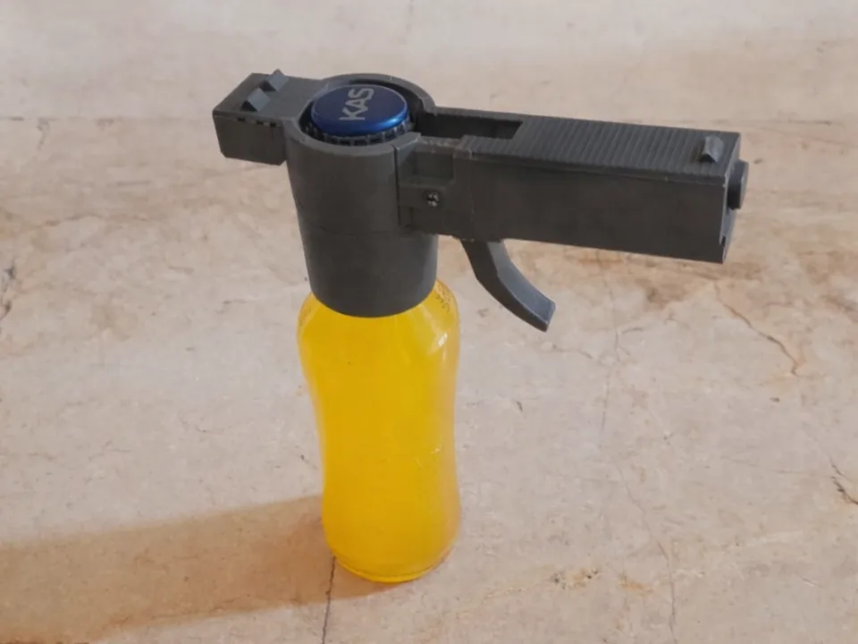 Abridor lanzador de chapitas de cerveza