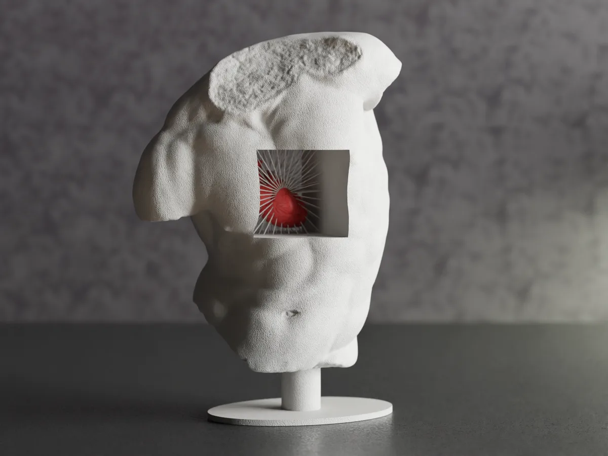 Escultura de manos que sostienen un corazón