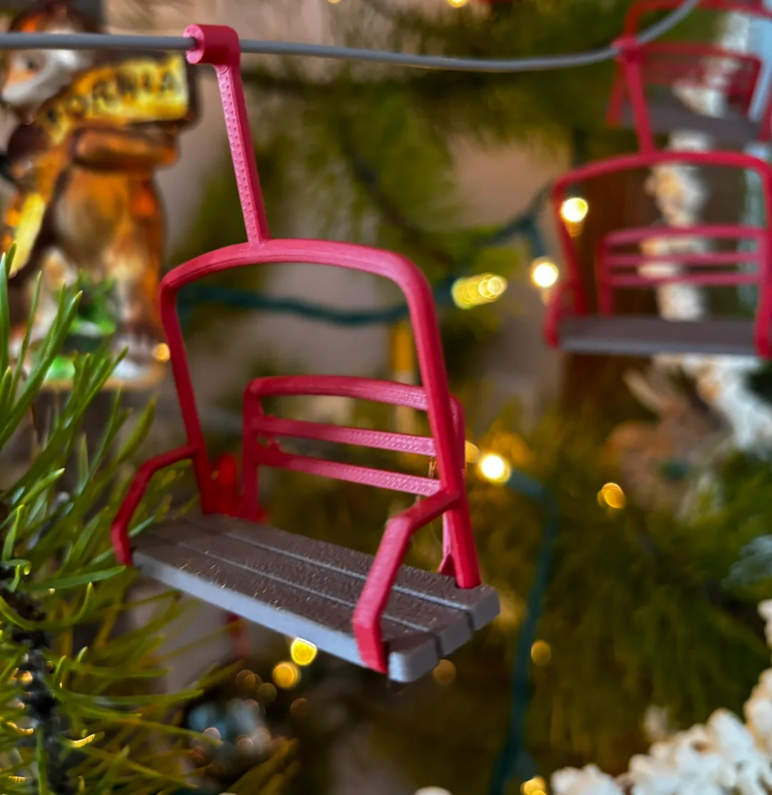 Adorno navideño con forma de aerosilla