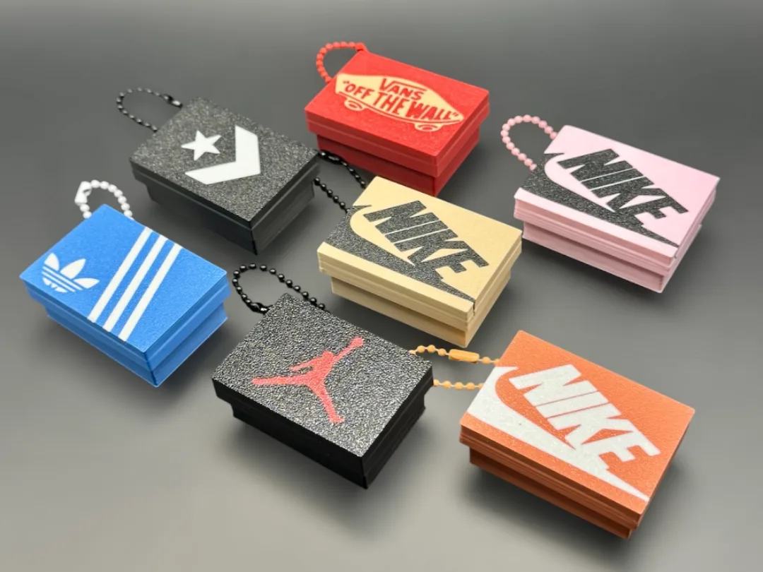 Antiestrés con forma de caja de zapatillas